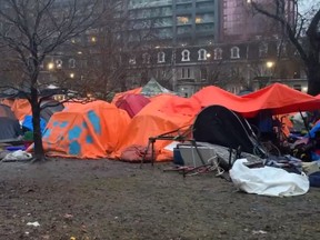 Encampments are seen at Clarence Square Park in downtown Toronto on Thursday, Dec. 28, 2023.