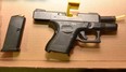 Durham Regional Police seized a gun after arresting an Ajax man in Oshawa last week.