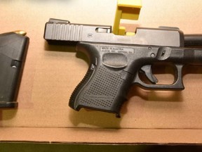 Durham Regional Police seized a gun after arresting an Ajax man in Oshawa last week.