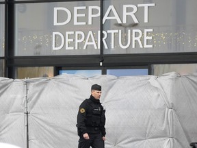 A police officer patrols at the Vatry airport