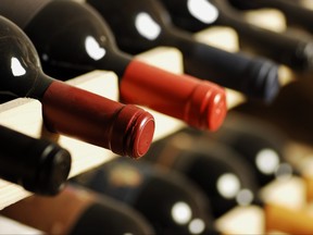 Wine bottles stored in a shelf are pictured in this file photo