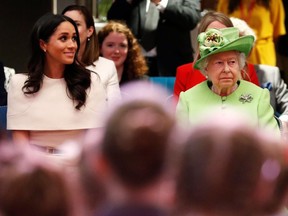 Queen Elizabeth II and Meghan, Duchess of Sussex visits the Storyhouse on June 14, 2018 in Chester, England.