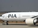 A Pakistan International Airlines (PIA) government aircraft taxis before takeoff from Karachi International Airport in Karachi on April 21, 2010.