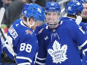 The Toronto Maple Leafs' Mitchell Marner is congratulated.