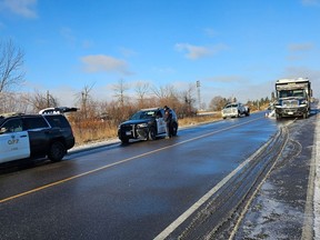 Caledon OPP at the scene of a deadly collision involving an SUV and a school bus on Heart Lake Road in Caledon on Tuesday, Dec. 19, 2023.
