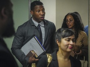Actor Jonathan Majors arrives at court for his domestic abuse trial.