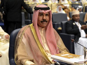 Kuwait's then-Crown Prince Sheik Nawaf Al-Ahmad Al-Jaber Al-Sabah attends the closing session of the 25th Arab Summit in Bayan Palace in Kuwait City, Wednesday, March 26, 2014.