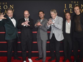 Holt McCallany, from left, Sean Durkin, Zac Efron, Kevin Von Erich, Jeremy Allen White and Stanley Simons attend the premiere of "The Iron Claw," Monday, Dec. 11, 2023, at the DGA Theater in Los Angeles.