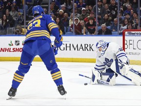 Buffalo Sabres' Mattias Samuelsson is stopped by Maple Leafs goaltender Ilya Samsonov during the first period on Thursday, Dec. 21, 2023, in Buffalo.