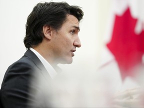 Prime Minister Justin Trudeau takes part in an interview at the Office of the Prime Minister and Privy Council in Ottawa on Monday, Dec. 11, 2023.