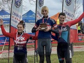 Two transgendered athletes stand on the podium following the state Cyclo-cross championships in Illinois.