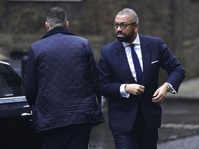 Britain's Home Secretary James Cleverly arrives for a Cabinet meeting