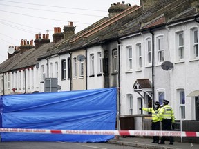 Police cordon off a property in Collingwood Road, Sutton
