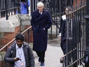 FILE - James Dyson arrives at the Royal Courts of Justice, in London, on Nov. 21, 2023. Billionaire vacuum cleaner tycoon James Dyson lost a libel lawsuit Friday against the Daily Mirror for a column that suggested he was a hypocrite who "screwed" Britain by moving his company's headquarters to Singapore after supporting the campaign in favor of the U.K.'s breakup with the European Union.