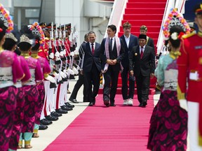 Prime Minister Justin Trudeau, accompanied by son Xavier, arrives in Jakarta, Indonesia on Tuesday, Sept. 5, 2023, to attend the ASEAN Summit.