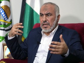 Ghazi Hamad, a member of Hamas' decision-making political bureau, speaks during an interview with The Associated Press in Beirut, Lebanon, Thursday, Oct. 26, 2023.
