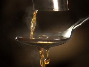 Hot maple syrup is tested for consistency and clarity