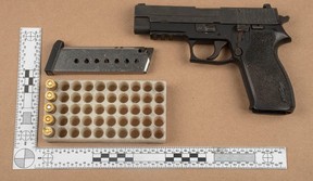 An image released by Peel police of a gun allegedly seized on Dec. 2, 2023 at a motel in the area of The West Mall & Dundas Street in Mississauga.
