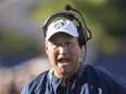 Toronto Argonauts head coach Scott Milanovich yells during play against the Hamilton Tiger-Cats during the second half of CFL football pre-season action in Toronto, Saturday June 11, 2016. Milanovich is the new head coach of the Hamilton Tiger-Cats. The CFL team named him as the 27th head coach in franchise history this morning.