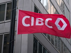 The CIBC logo is displayed on a flag in front of its headquarters in Toronto on Monday, Oct. 25, 2021.