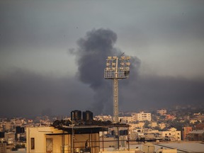 Smoke rising from Israeli air strikes on the city of Khan Yunis on Dec. 16, 2023 in Khan Yunis, Gaza.
