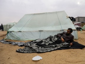 Displaced Palestinians are pictured along with makeshift tents in the so-called safe zone on Dec. 21, 2023 in Al-Mawasi, Rafah, Gaza.