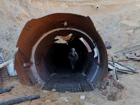 Israeli soldier exits a tunnel that Hamas reportedly used