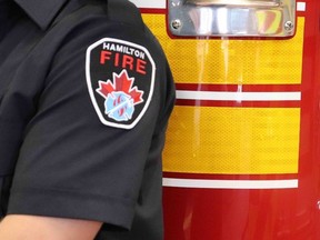 A Hamilton Fire Department logo.