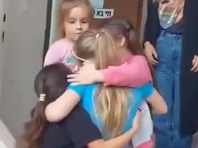 Israeli girl reunites with classmates after her release by Hamas.