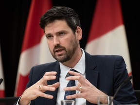 Minister of Housing, Infrastructure and Communities Sean Fraser responds to a question during a news conference, in Ottawa, Tuesday, Dec. 5, 2023. Fraser says Canadians can expect to see a full plan from the federal government in 2024 that lays out how it will tackle the housing crisis.THE CANADIAN PRESS/Adrian Wyld