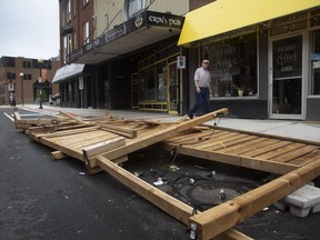 An outdoor seating area of Erin's Pub on Water Street was demolished after Hurricane Larry crossed over Newfoundland's Avalon Peninsula in the early morning hours, in St. John's, on Sept. 11, 2021.
