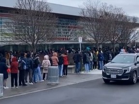 Screengrab of line at job fair in Brampton.