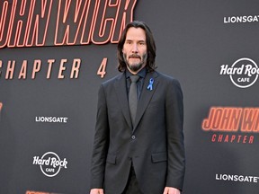 Keanu Reeves appears at the John Wick Chapter 4 premiere