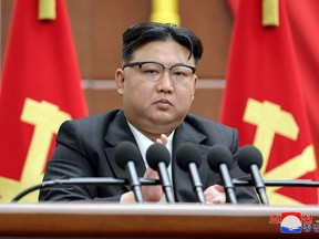This undated picture released by North Korea's official Korean Central News Agency (KCNA) via KNS on Dec. 31, 2023 shows North Korean leader Kim Jong Un speaking at the 9th Plenary Session of the 8th Central Committee of the Workers' Party of Korea (WPK) at the Party's Central Committee headquarters building in Pyongyang.