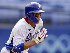 FILE - South Korea's Jung Hoo Lee plays during a baseball game at Yokohama Baseball Stadium during the 2020 Summer Olympics, Aug. 2, 2021, in Yokohama, Japan. Lee, a South Korean MVP and the son of a former MVP, will become a free agent Tuesday, Dec. 5, 2023, and major league teams can sign him through 5 p.m. EST on Jan. 3.