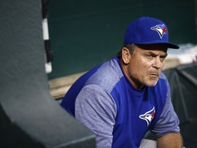 FILE - Toronto Blue Jays manager John Gibbons sits in the dugout before a baseball game against the Baltimore Orioles, Sept. 18, 2018, in Baltimore. The New York Mets announced the hiring of Gibbons on Monday, Dec. 4, 2023, as bench coach under new manager Carlos Mendoza.