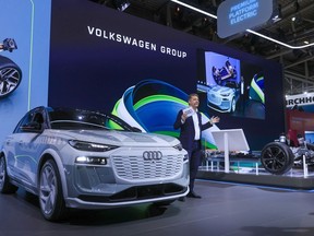 Gernot Dollner presents an Audi Q6 e-tron prototype at the Munich Motor Show in Munich, Germany, in September.