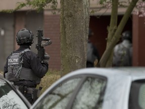 Dutch counter terrorism police prepare to enter a house after a shooting incident in Utrecht, Netherlands, on March 18, 2019.
