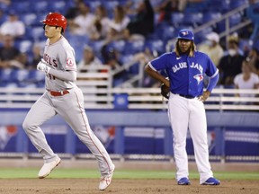 Shohei Ohtani rounds the bases after hitting a solo home run against the Blue Jays at TD Ballpark on April 9, 2021 in Dunedin, Fla. while with the Angels.