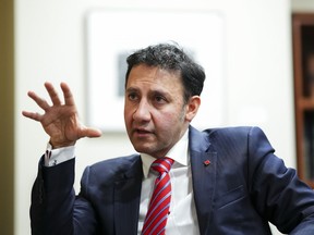 Justice Minister and Attorney General of Canada Arif Virani takes part in an interview in Ottawa on Wednesday, Dec. 13, 2023.