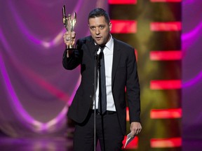 George Stroumboulopoulos reacts after winning the award for best variety host for his show "George Stroumboulopoulos Tonight" at the Canadian Screen Awards in Toronto on Sunday, March 3, 2013.