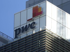 CPA Ontario says accounting firm PwC has paid $1.45 million in fines and costs for breaching the regulatory organization's code of professional conduct. Signage appears on the Australian head office building of PricewaterhouseCoopers in Sydney, Monday, June 26, 2023.