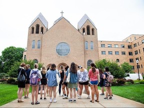 Students standing in front of building at Saint Marys College in Notre Dame, Indiana.