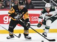 Sidney Crosby of the Pittsburgh Penguins skates with the puck