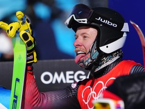 Canada's Jared Schmidt reacts following his run in the freestyle men's ski cross 1/8 finals during the Beijing Winter Olympic Games, in Zhangjiakou, China, Friday, Feb. 18, 2022. It was another successful day for Ottawa's Schmidt siblings on the World Cup ski cross circuit.