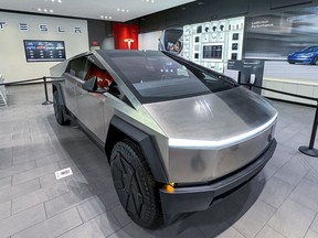 A Tesla Cybertruck is displayed at a Tesla store in San Jose, Calif., Tuesday, Nov. 28, 2023.