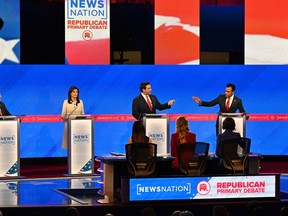 Republican presidential candidates, from left, Chris Christie, Nikki Haley, Florida Gov. Ron DeSantis and Vivek Ramaswamy, during a Republican debate in Tuscaloosa, Ala., on Dec. 6.