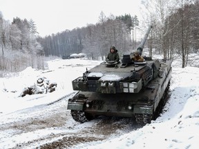 A Leopard 2 A5 main battle tank is seen during testing at the Gaiziunai military training area near the Rukla military base, Lithuania on Dec. 15, 2023. The Leopard 2 A5 main battle tank was brought from the combat in Ukraine and repaired in Lithuania.