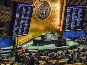 Display monitors show the result of voting in the United Nations General Assembly, in favour of a resolution calling on Israel to uphold legal and humanitarian obligations in its war with Hamas, Tuesday, Dec. 12, 2023 at UN headquarters.