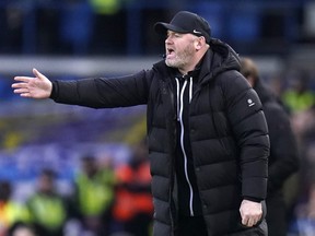 Birmingham City manager Wayne Rooney gestures on the touchline.